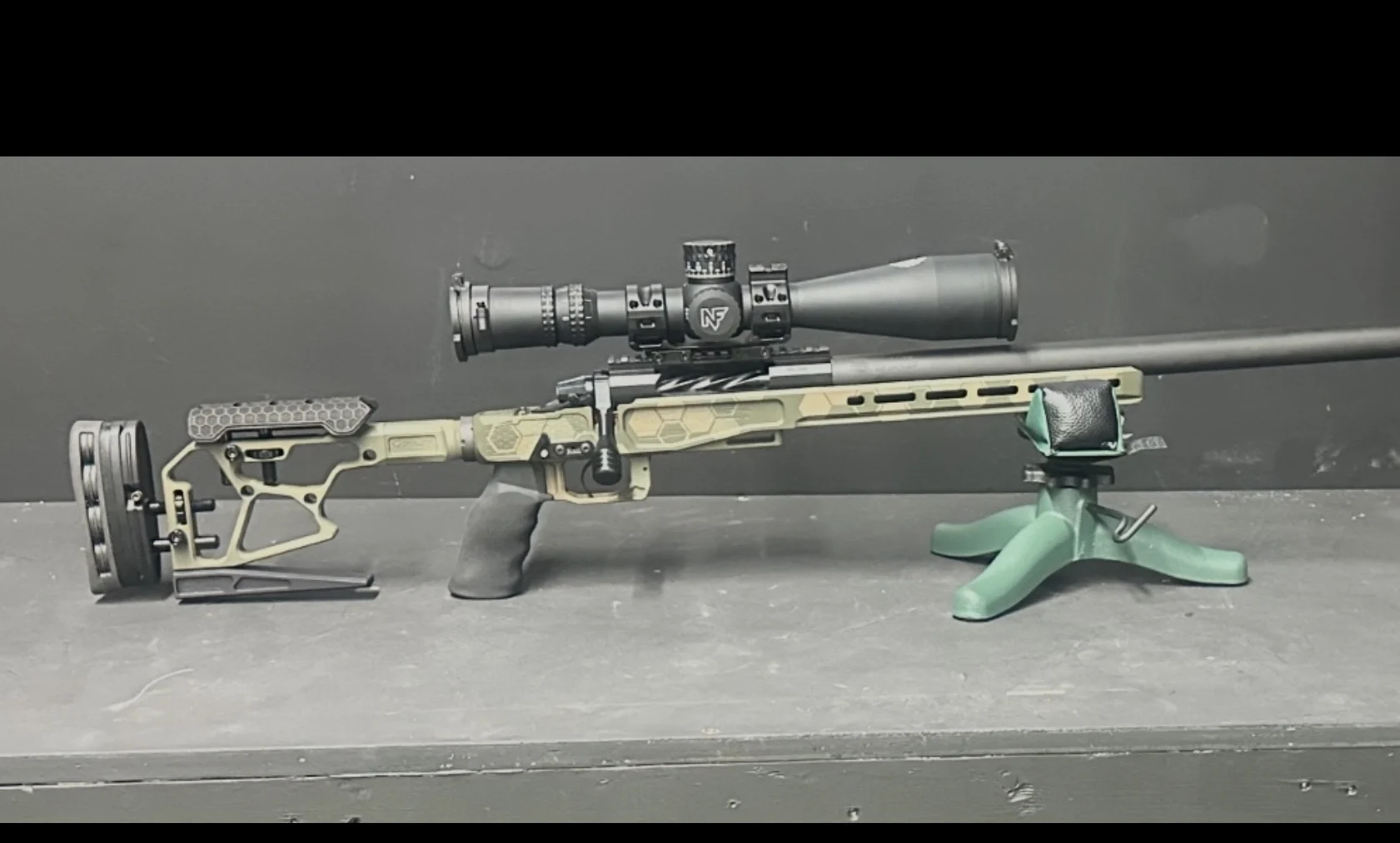 Precision rifle with adjustable chassis stock