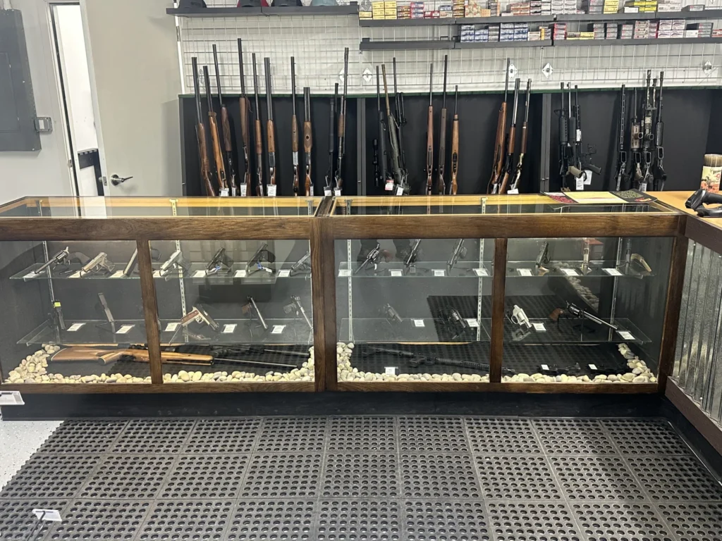 Firearm display counter and rifle racks inside Windage Weaponry