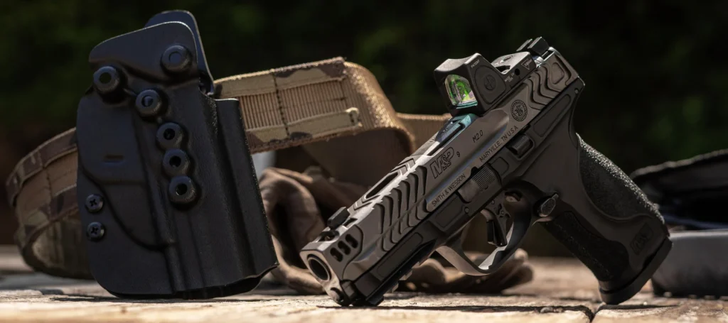 Smith & Wesson M&P M2.0 pistol resting on a shooting bench